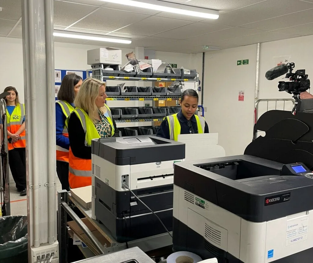 Junior ILG employees being shown around an office