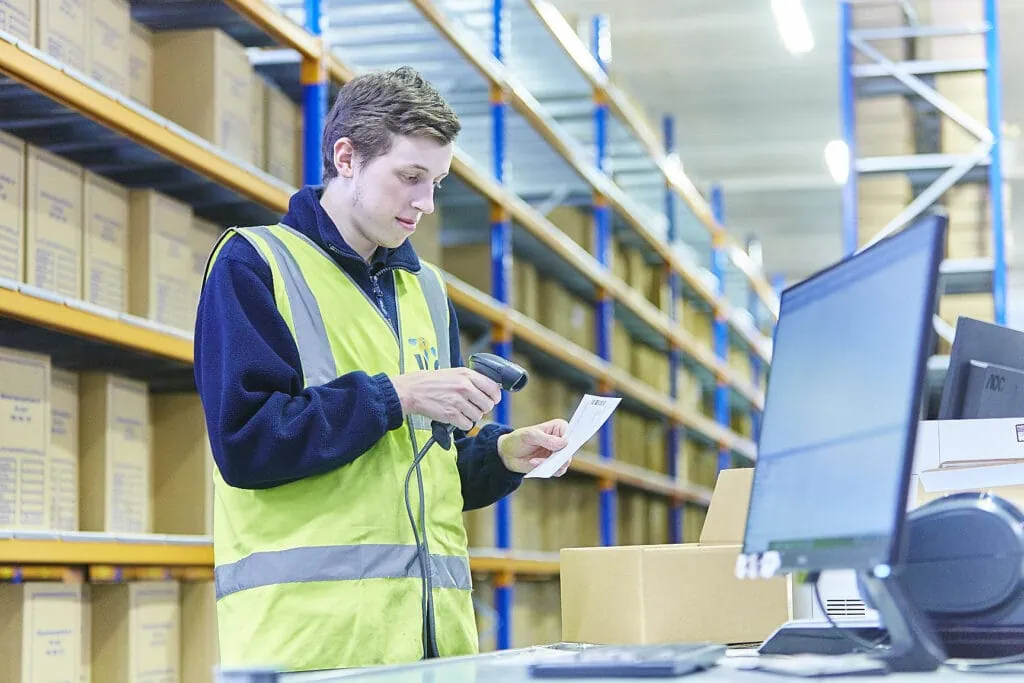 Man scanning label in ILG warehouse