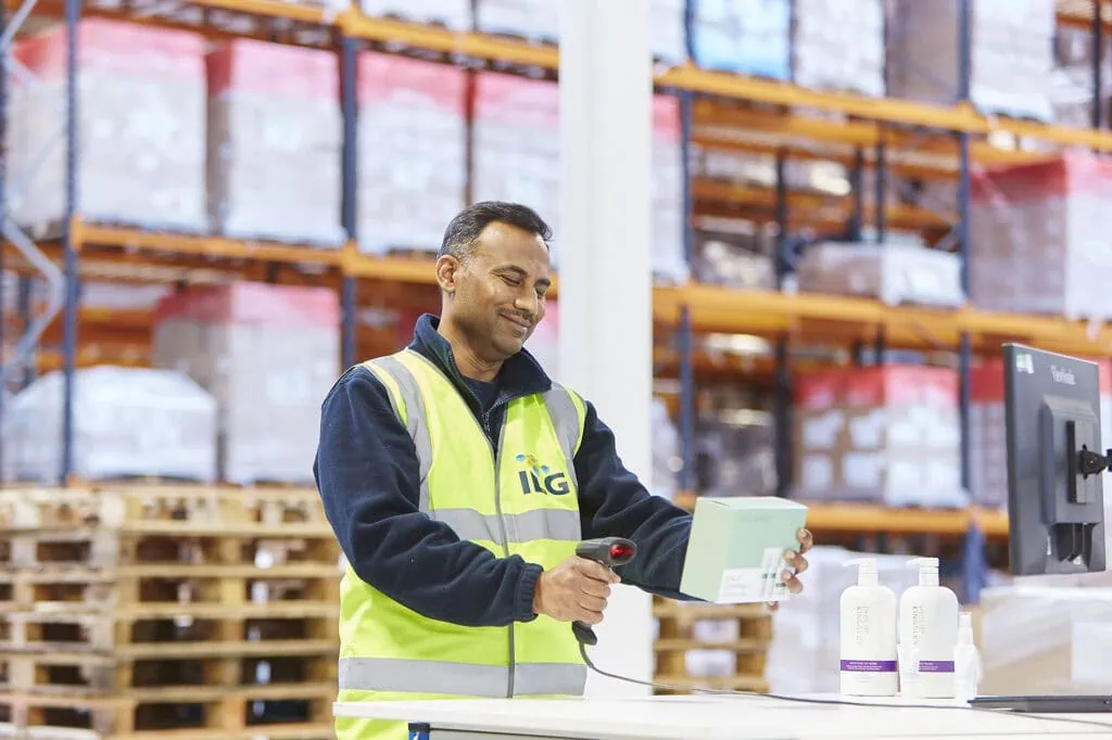ILG man scanning product in warehouse